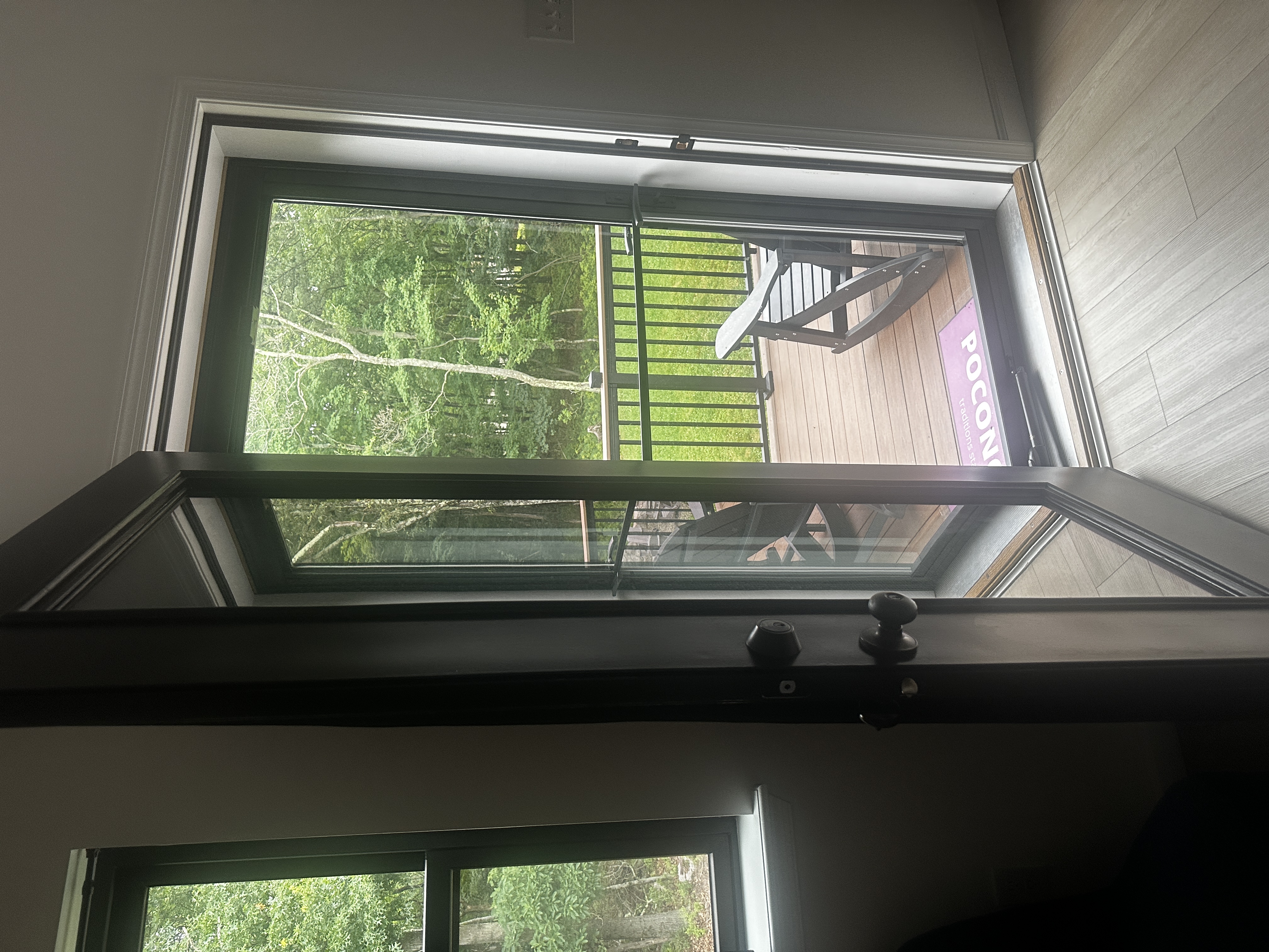 Back porch retractable storm door screen